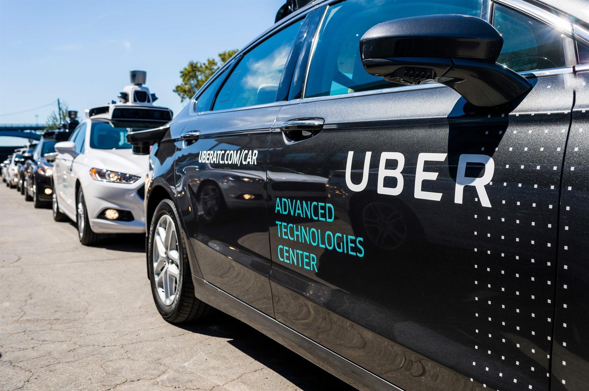 Uber suspends self-driving car tests after pedestrian death