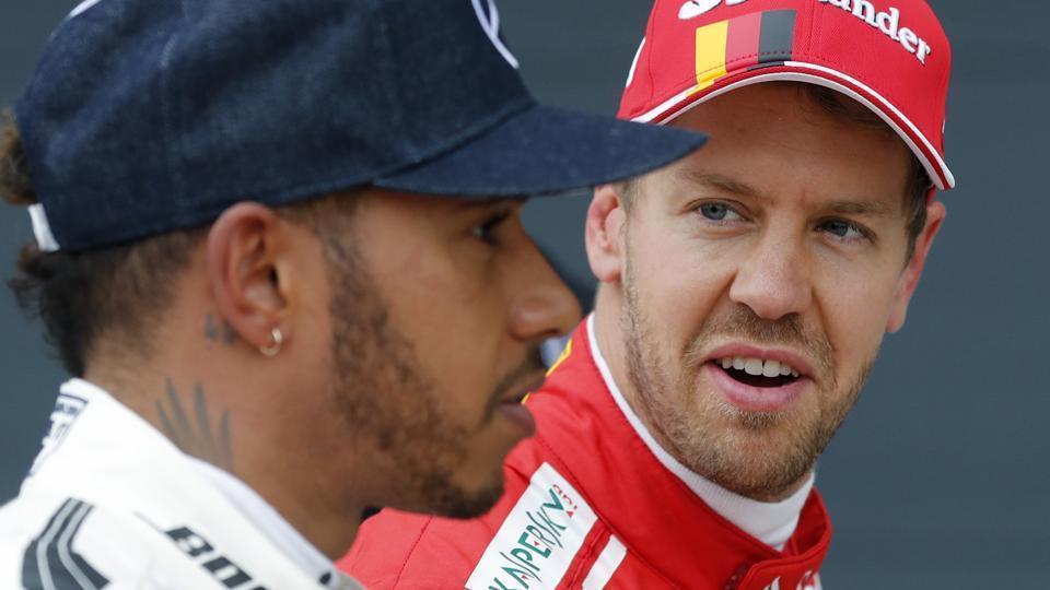 Hamilton, Vettel kick off race for fifth title in Melbourne