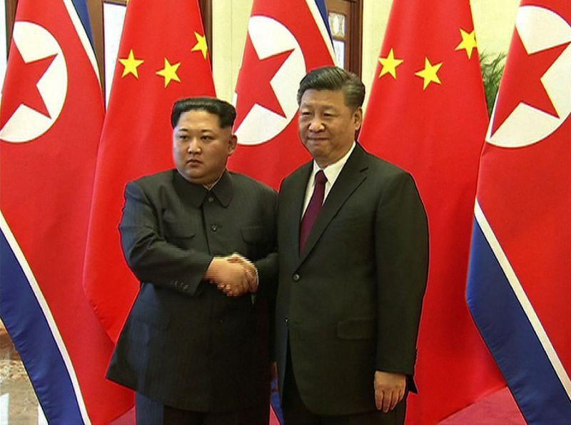 N Korea’s Kim shows unity with China’s Xi in first foreign trip