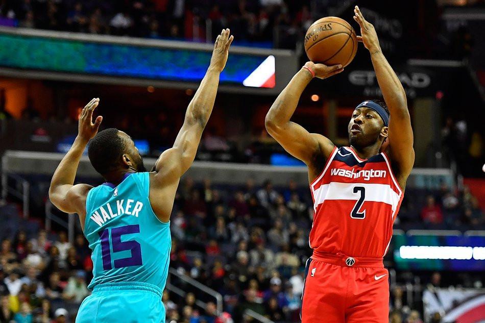 Wall stands tall as Wizards punch ticket to playoffs