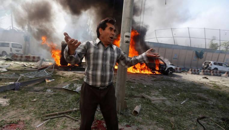 Suicide attack on Kabul election center kills at least 52