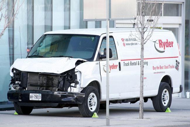 Driver kills 10, injures 15 plowing van into Toronto sidewalk crowd