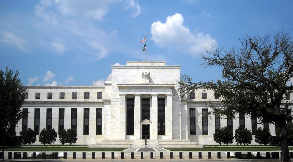 Fed leaves key interest rate unchanged, notes rising inflation