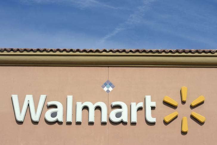Walmart buys 77 pct stake in India’s Flipkart for $16 bln