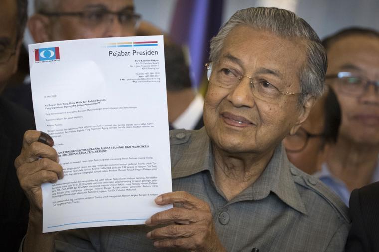 Mahathir claims clear mandate to govern Malaysia, vows reforms