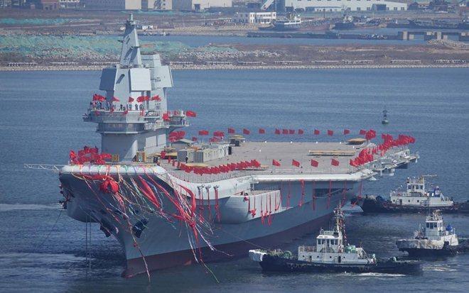 China’s first home-built carrier sets out for sea trials