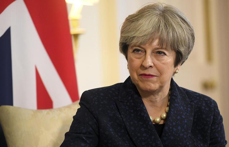 Britain’s May agrees with France, Germany on upholding Iran nuclear deal