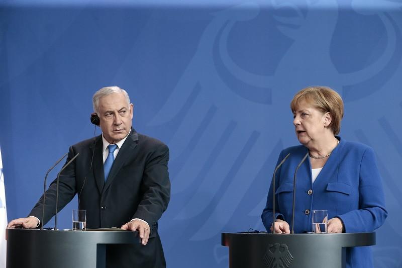 Netanyahu warns Merkel of new refugee crisis sparked by Iran