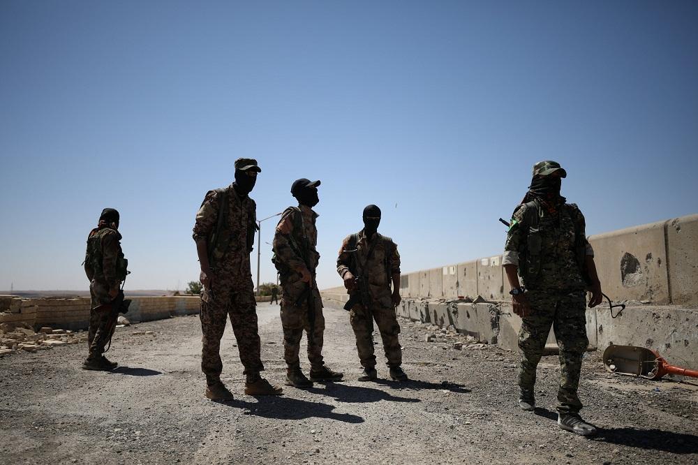 U.S.-backed Syrian Kurdish group ready to talk to Damascus