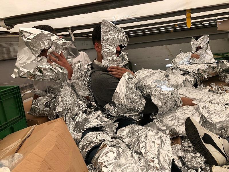 Undocumented migrants wrapped in aluminum foil caught on a truck in Istanbul