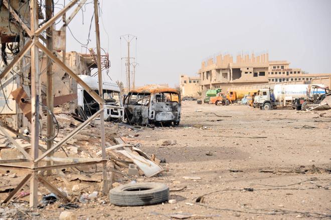 Syria says US-led strike hits troops in east, US denies