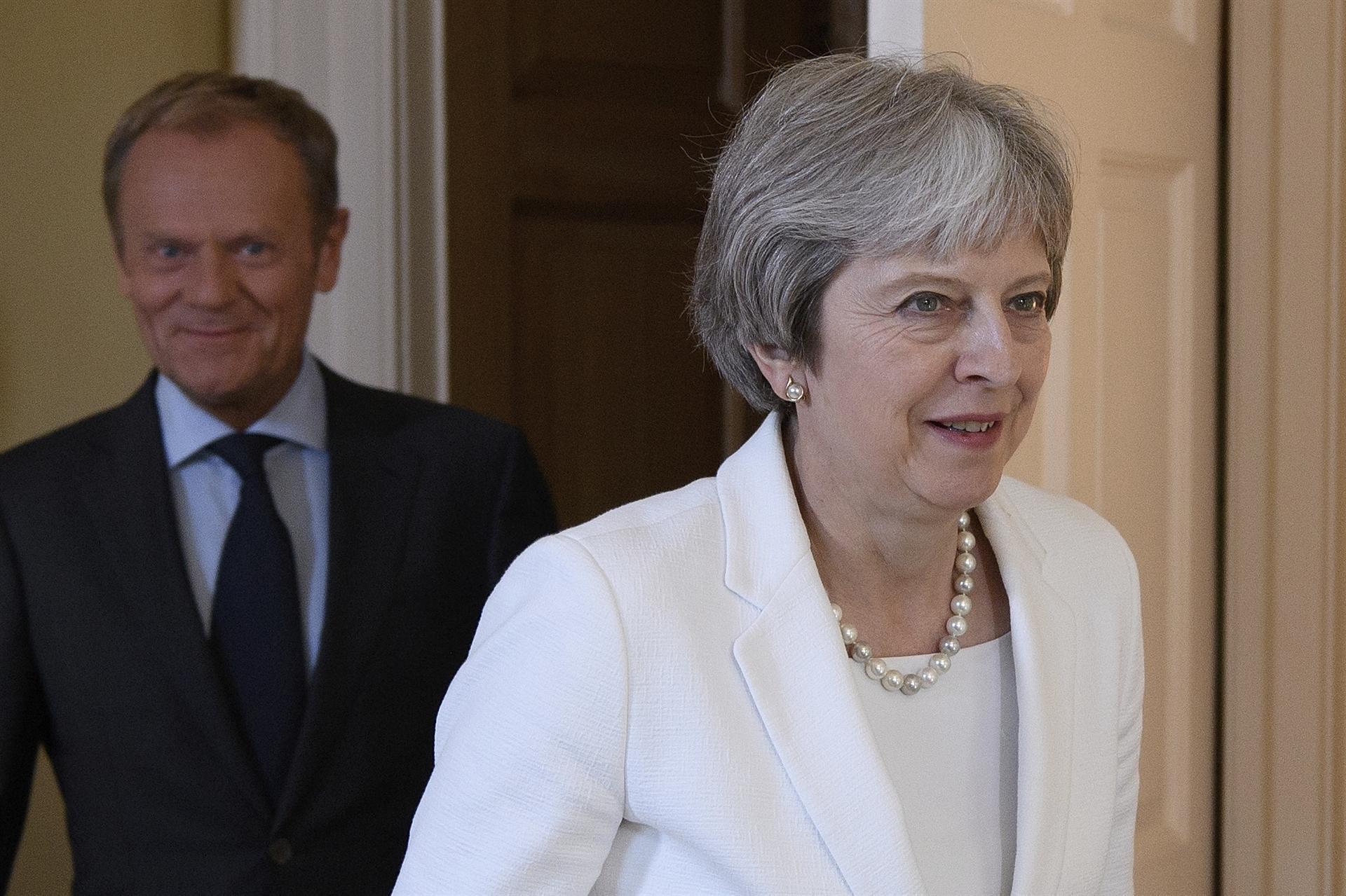 As investment stalls, auto industry warns May: Avert a Brexit car crash