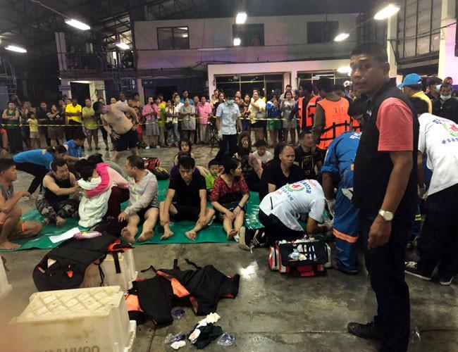 21 dead, dozens missing as tourist boat sinks
