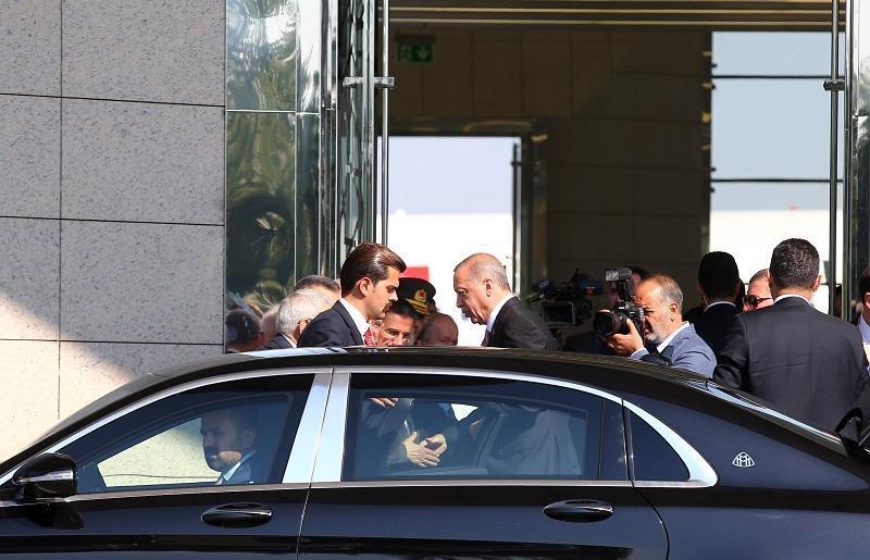Sworn in with new powers, Erdoğan leaves on first trip
