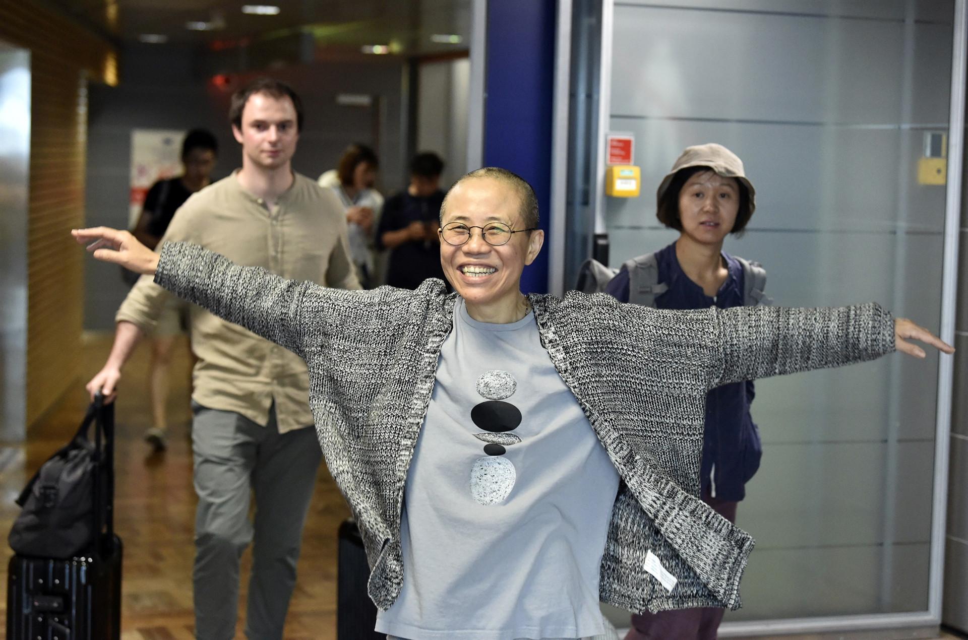 Hong Kong activists celebrate after Liu Xia leaves China