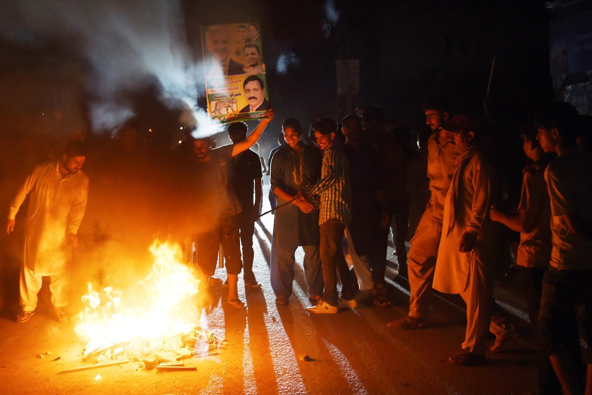 Sharif in custody as 132 die in Pakistan election violence