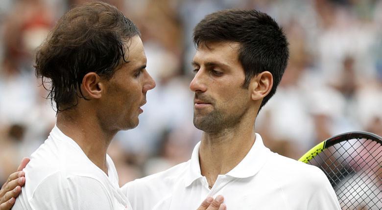 Federer, Nadal threaten Djokovic bid for historic Slam