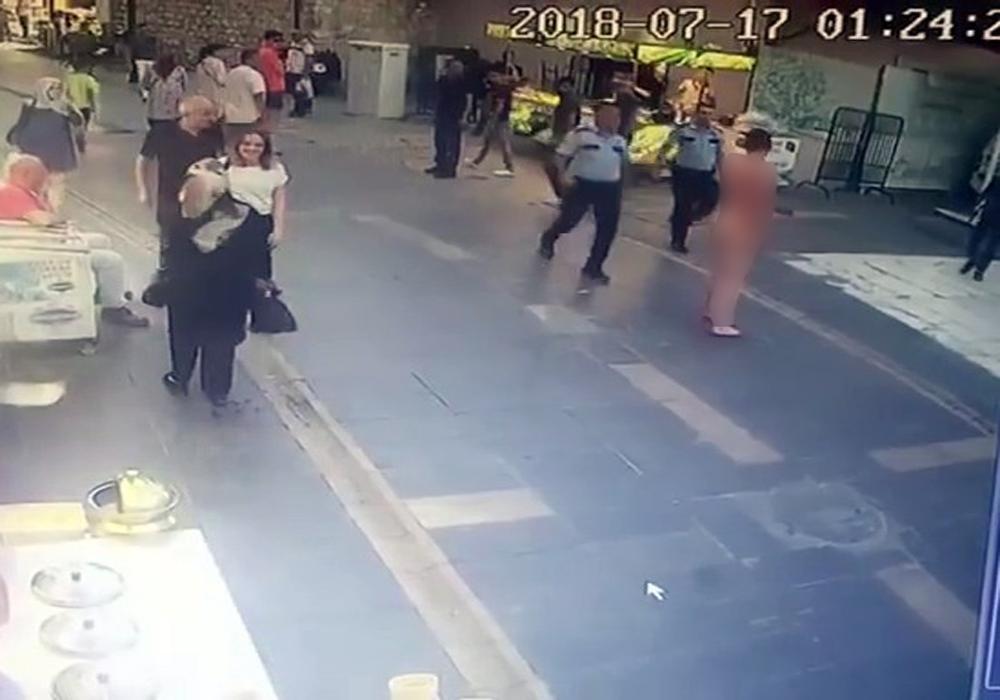 Naked murder suspect terrorizes Istanbul street with knife
