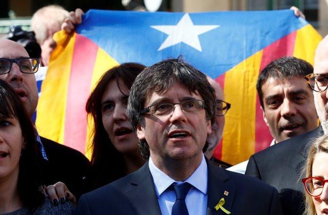 Spain drops international arrest warrants for Puigdemont, other Catalans