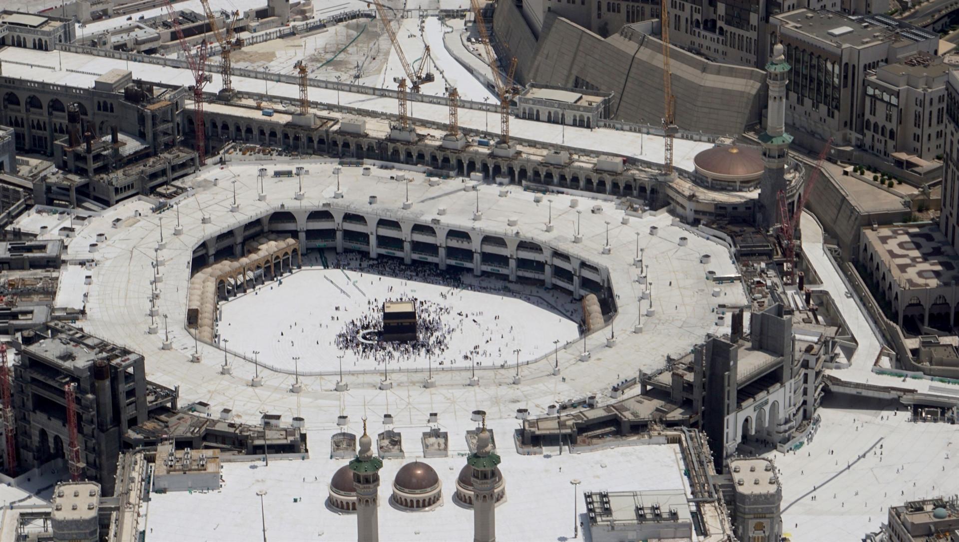 Muslim pilgrims scale Mount Arafat for peak of hajj
