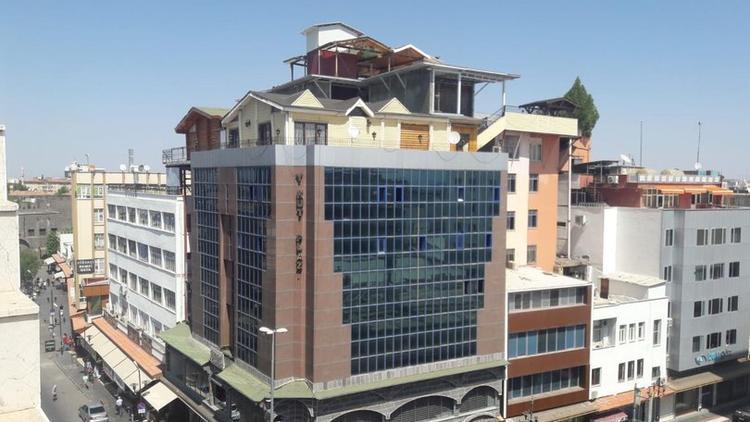 Turkish businessman accused of ‘building villa on top of another building’