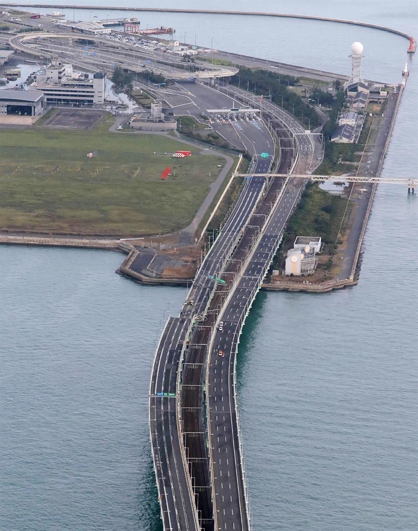 Powerful typhoon kills 9, shutters airport in Japan
