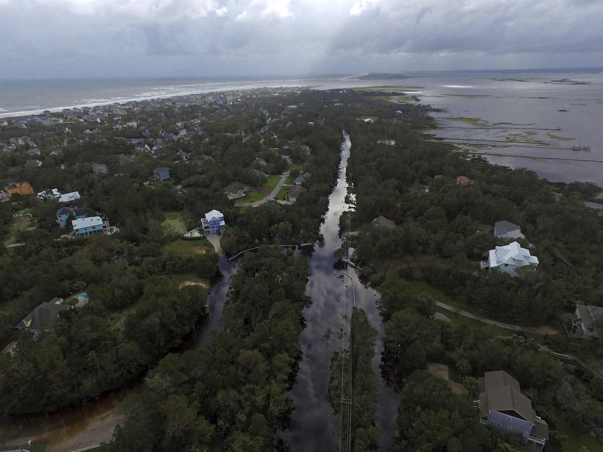 North Carolina devastated as floodwaters rise from deadly storm Florence