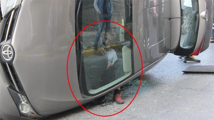 Turkish man gets stuck in car in odd position after accident