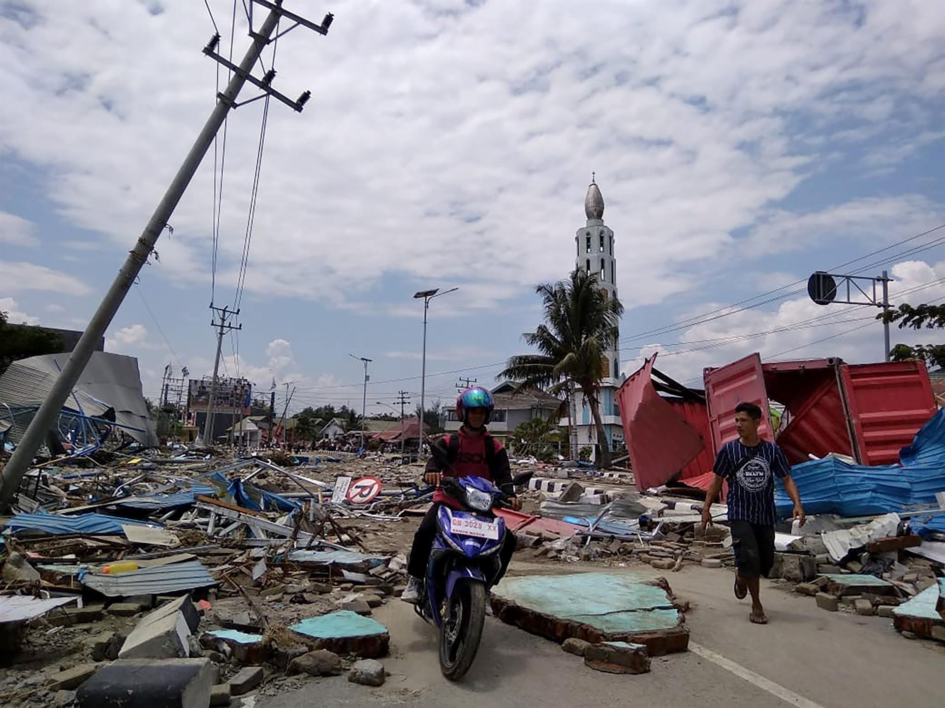 Scores killed in Indonesia earthquake-tsunami