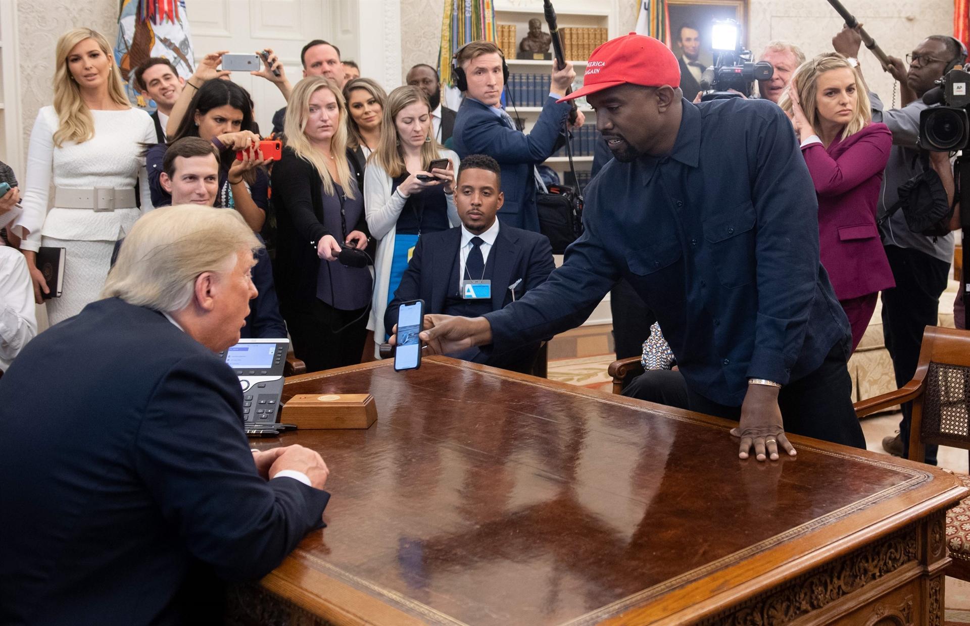 Kanye West, in ’MAGA’ hat, delivers surreal Oval Office show