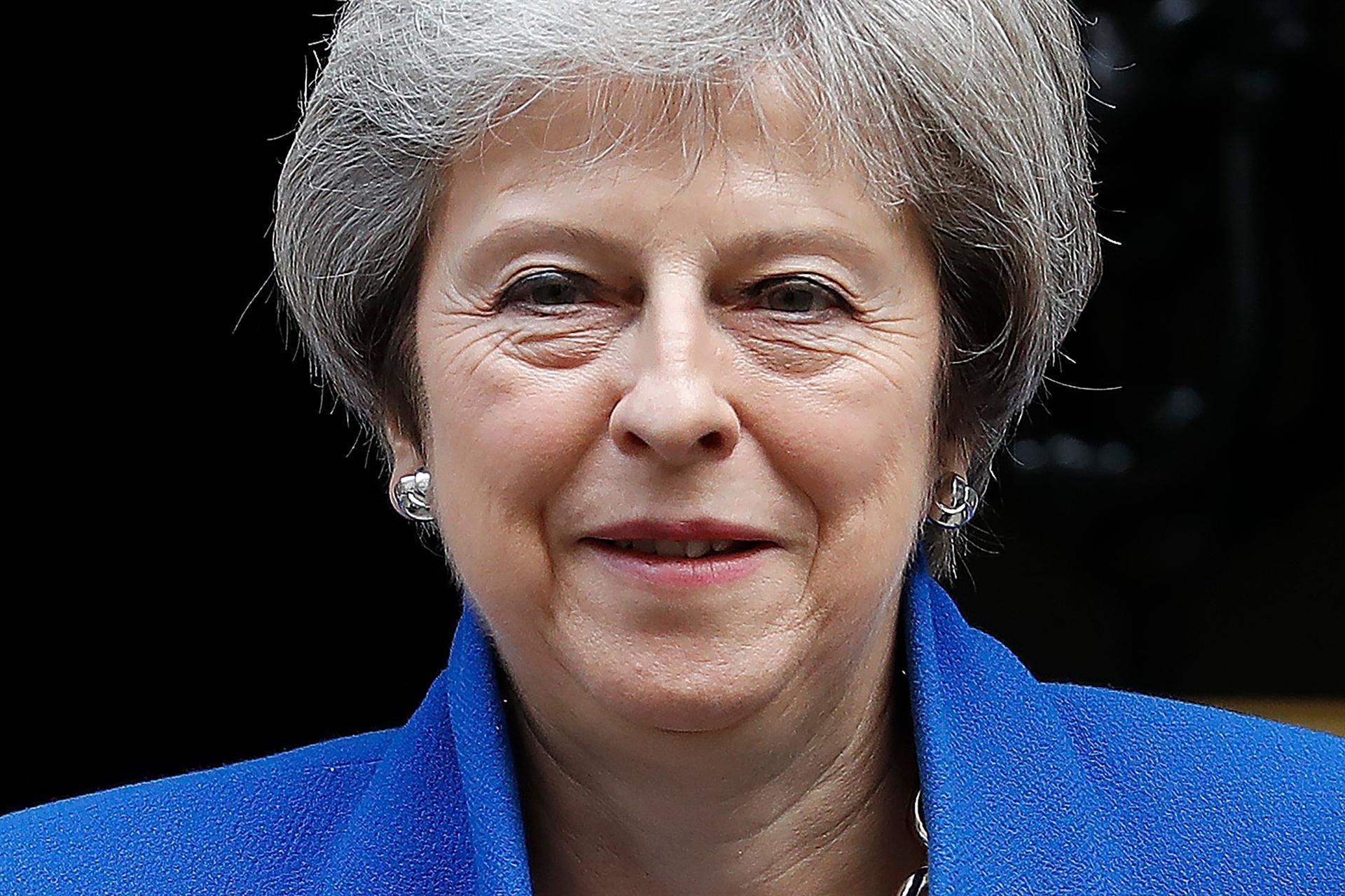 UK’s May takes Brexit deal to cabinet as MPs revolt