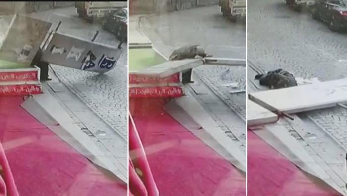 VIDEO: Turkish pensioner dodges death as falling billboard breaks his shoulder