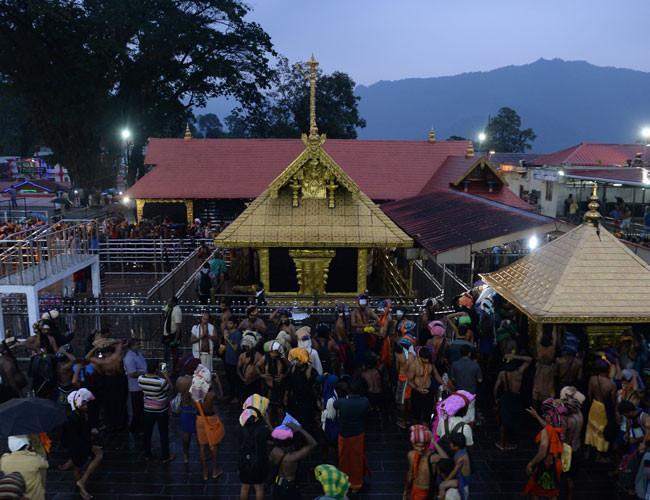 Two women defy centuries-old ban by entering Indian temple