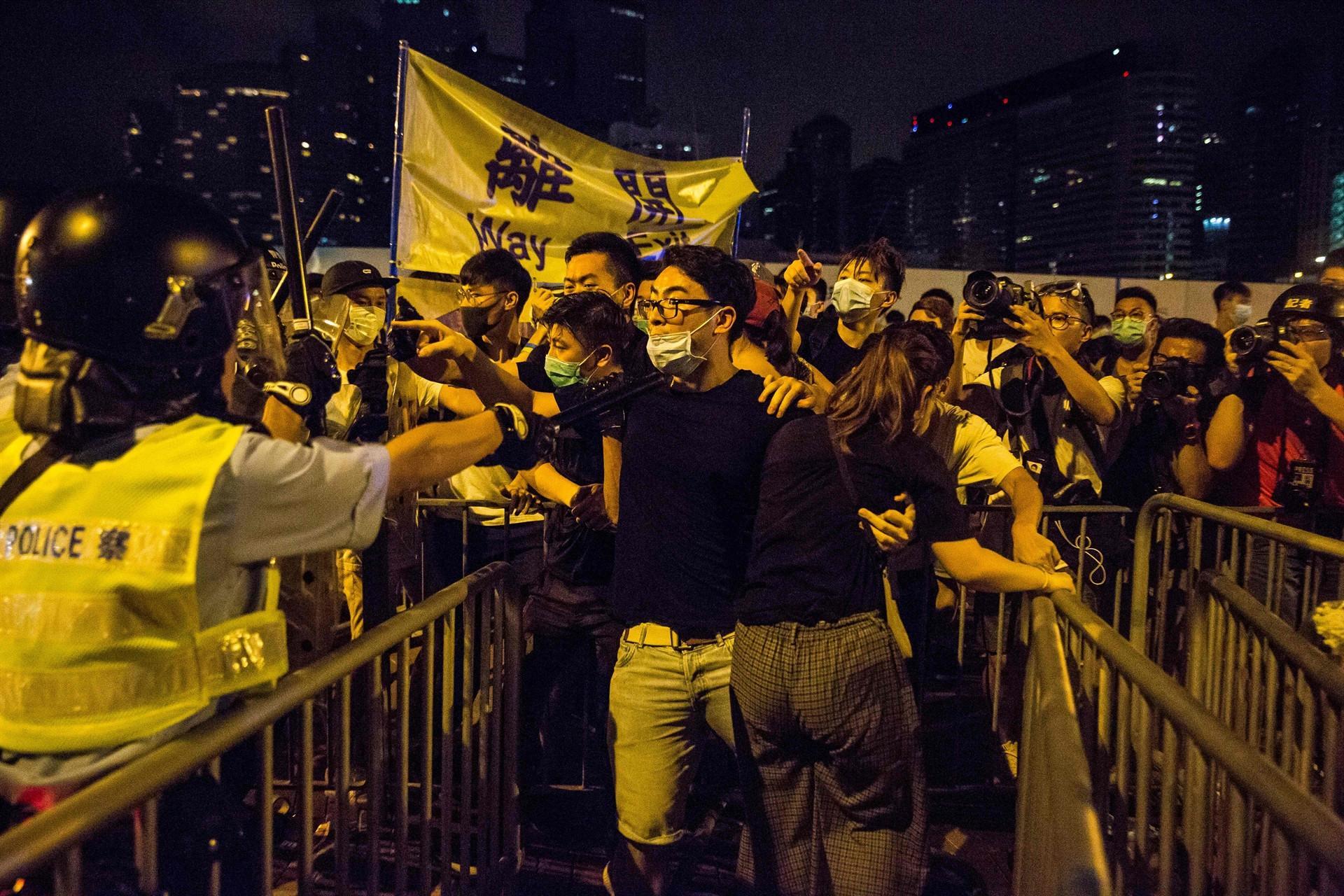 Violence mars end of huge Hong Kong protest against China extradition