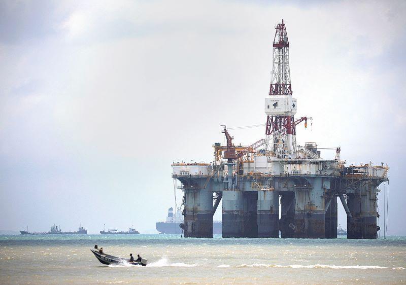 IEA cuts oil demand forecast over global economy worries