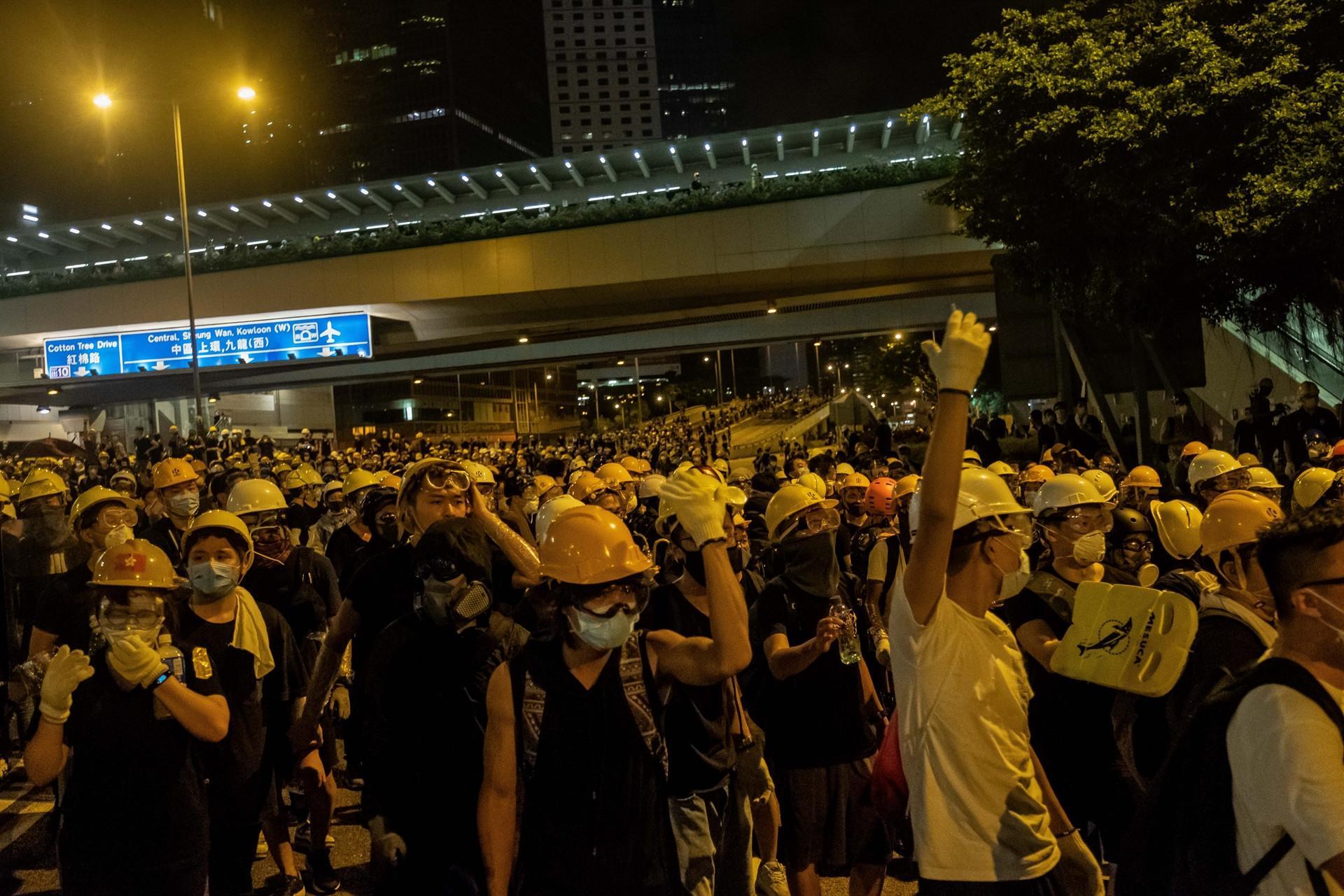 Tense calm returns to Hong Kong after protests erupt into violence