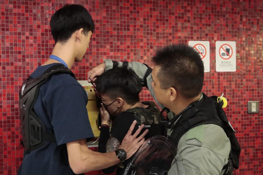 Hong Kong protesters target trains, urge general strike
