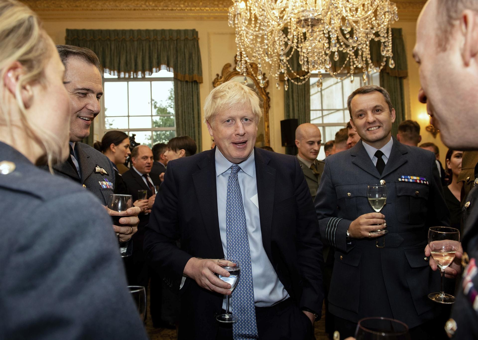 Johnson faces Brexit flak from EU lawmakers and top UK court