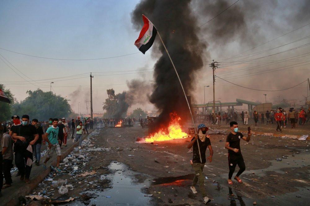 Iraqi PM addresses the nation, urges protesters to go home
