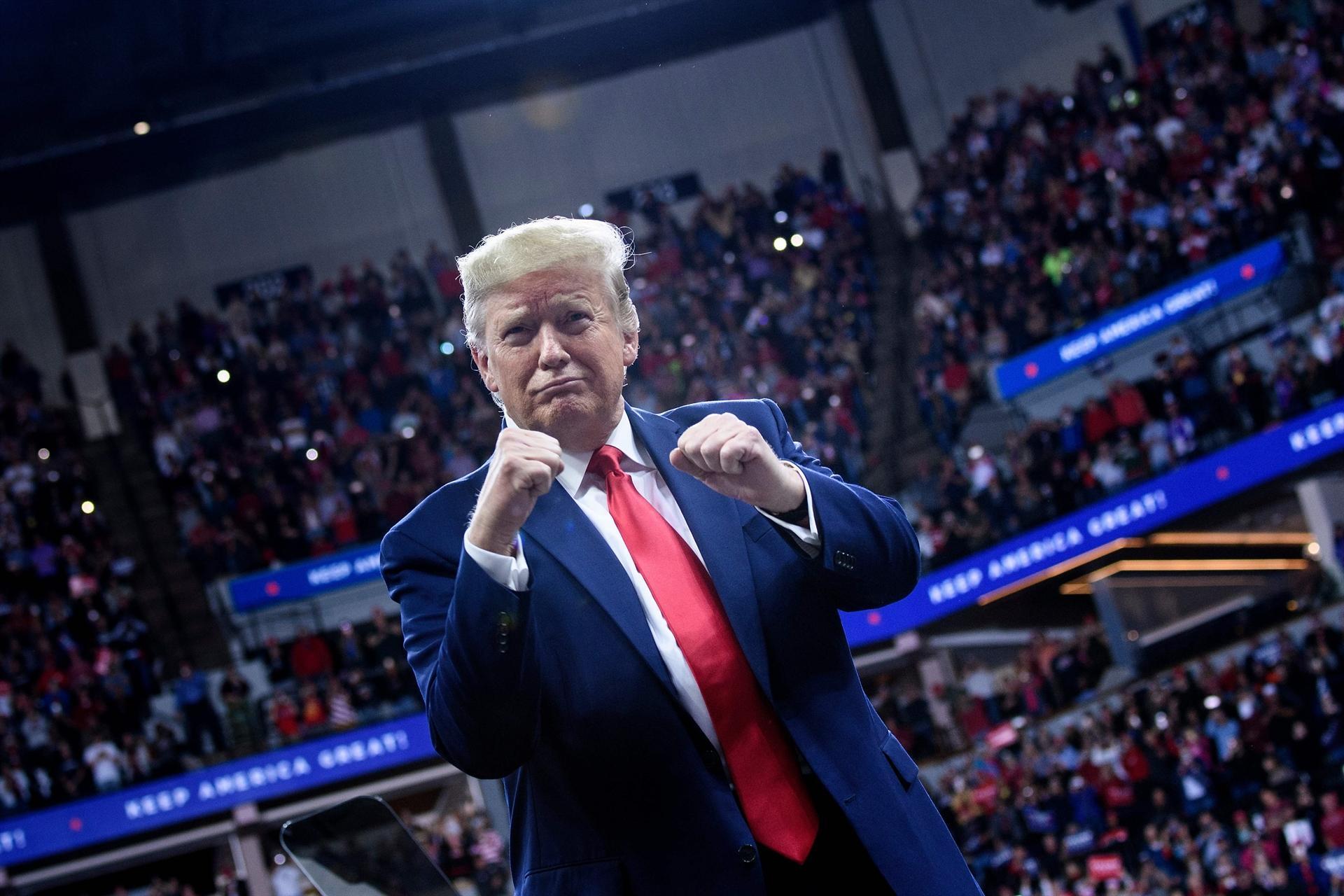 Trump attacks Biden, slams impeachment probe at Minneapolis rally