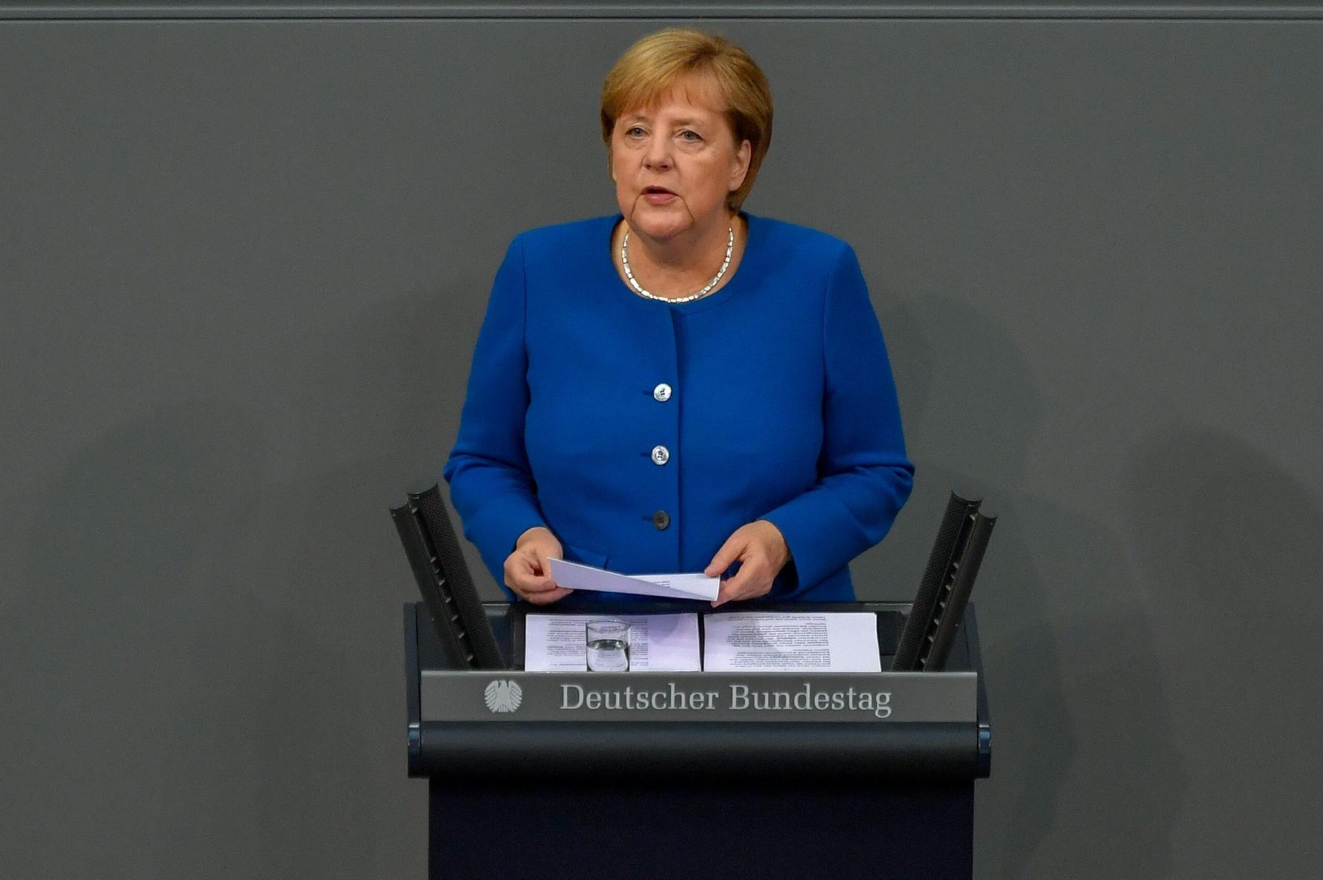 Merkel says more work needed on customs for Brexit deal, which is possible