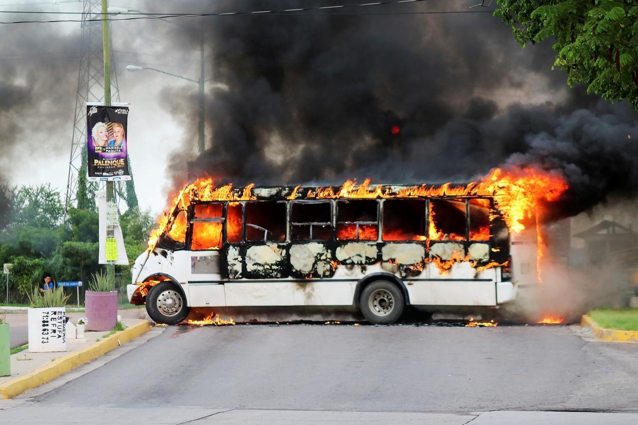 Cartel gunmen terrorize Mexican city, free El Chapos son