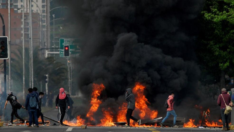 8 killed in Chile protests against metro price hikes