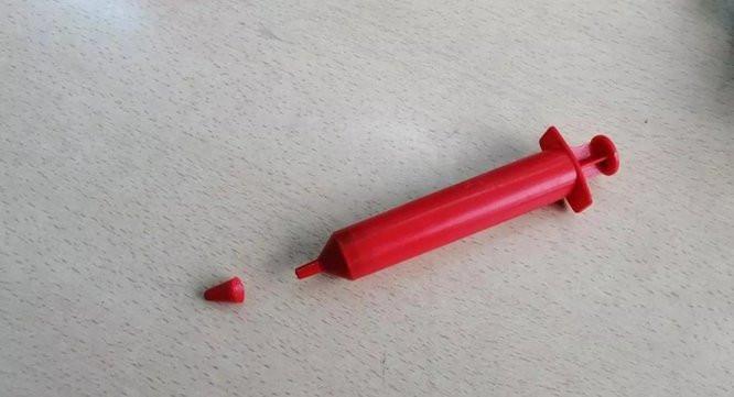 Two kids died from choking on the cap of a syringe-like chocolate tube