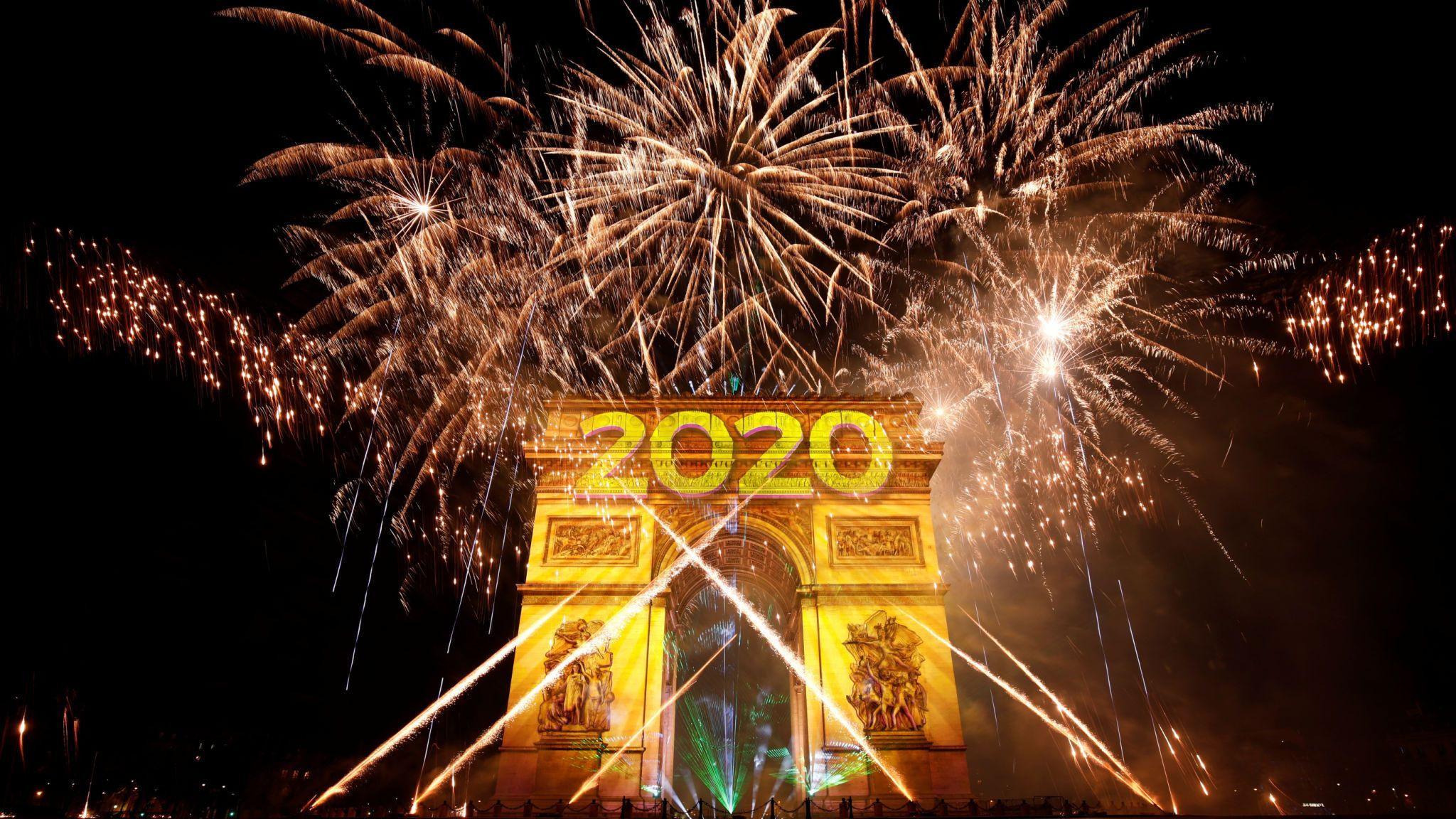 New Year fireworks, smoke and tear gas as decade begins with a bang