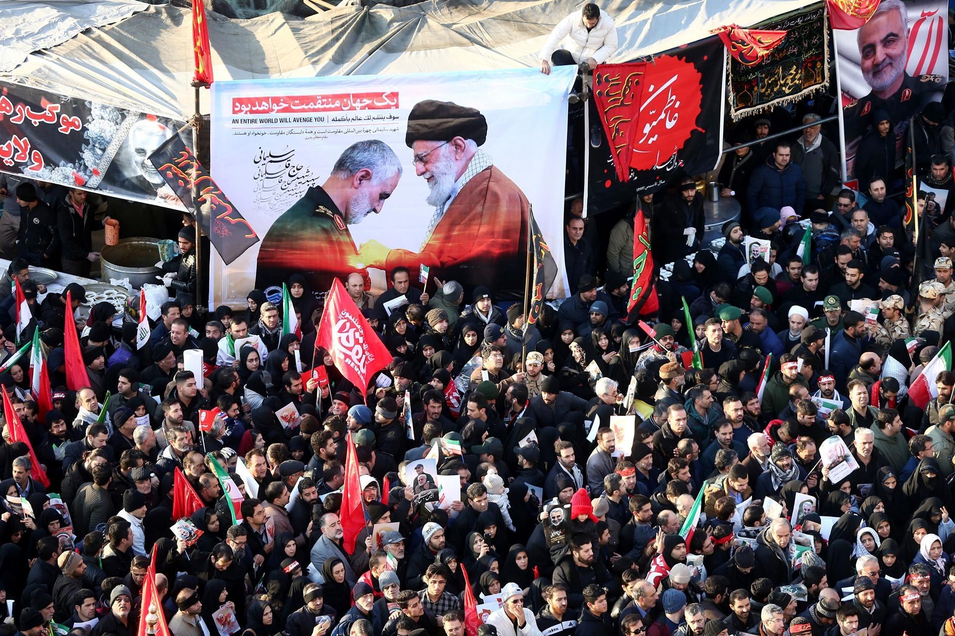 Huge crowds in Iran for commanders funeral, daughter warns US of dark day
