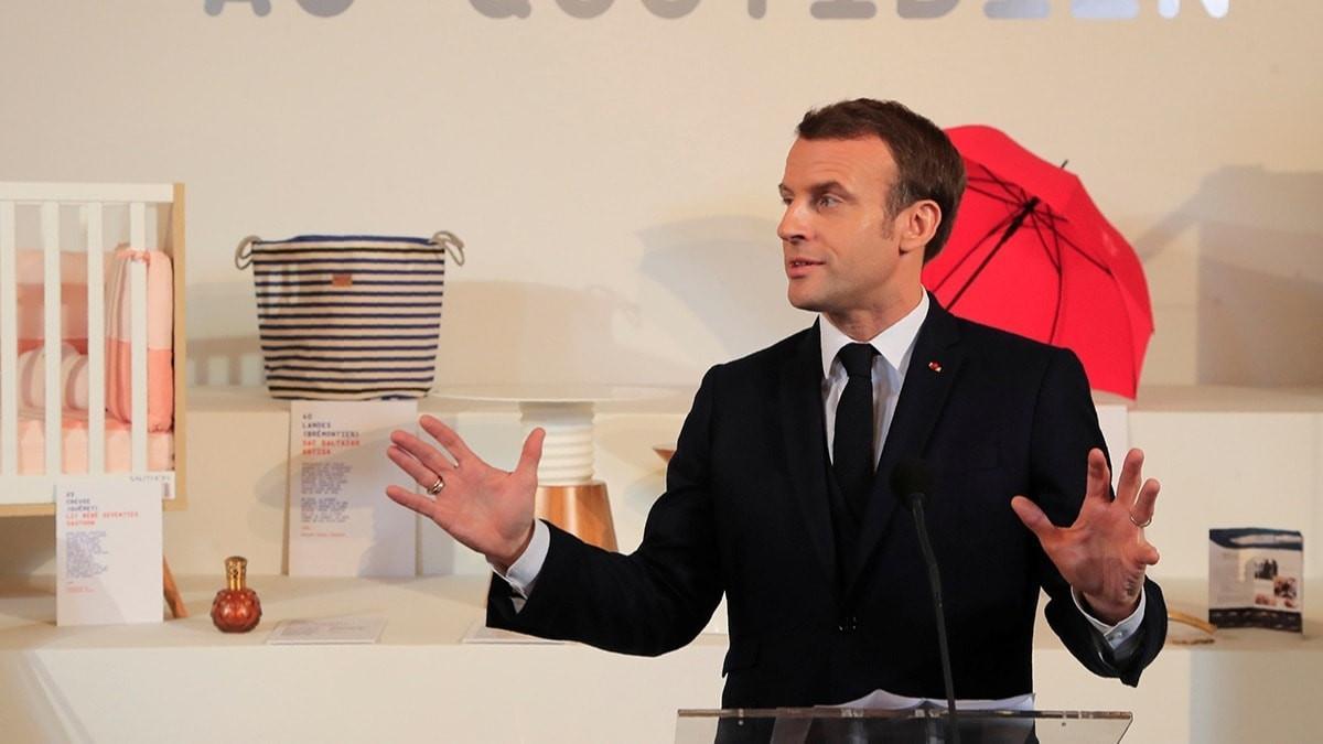 French police evacuate Macron from theatre amid protest