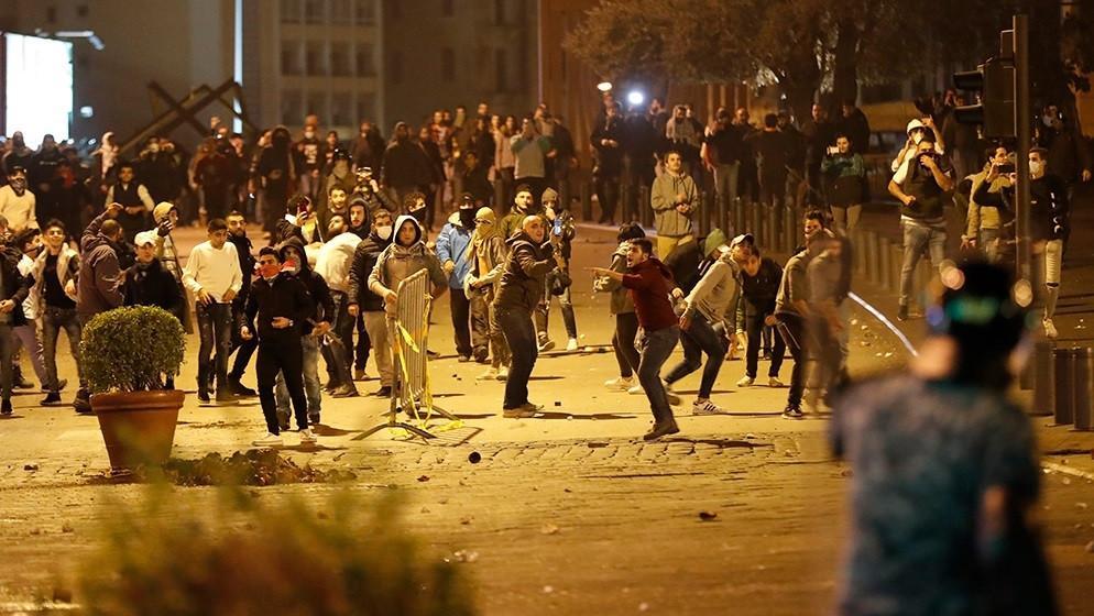 12 injured as protesters, police clash in Lebanon