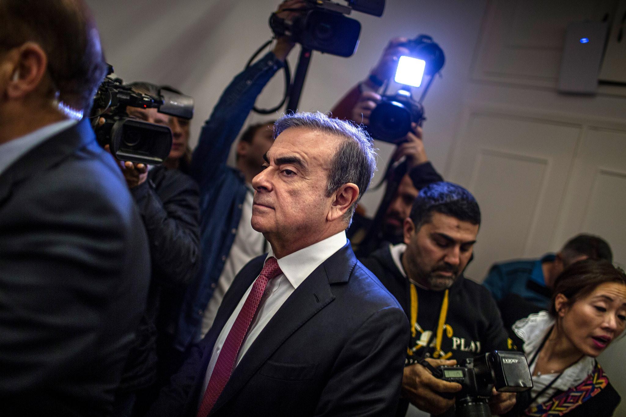 Japan issues warrants for ex-US soldier, two others for Ghosn escape