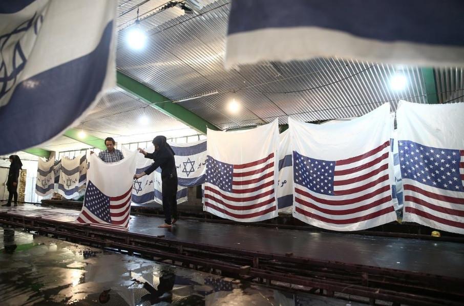 Iranian factory makes US and Israeli flags to burn